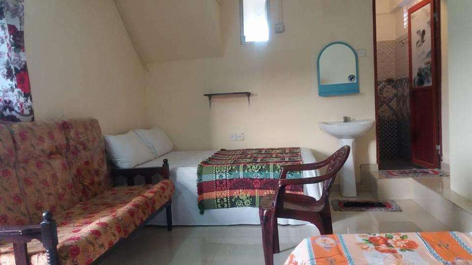 Posezení v ubytování Manimalar Hotel