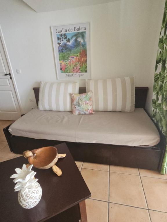 Posezení v ubytování TI OASIS Dominica - Pierre et Vacances - Piscine et Plage - 1 chambre 1 salon