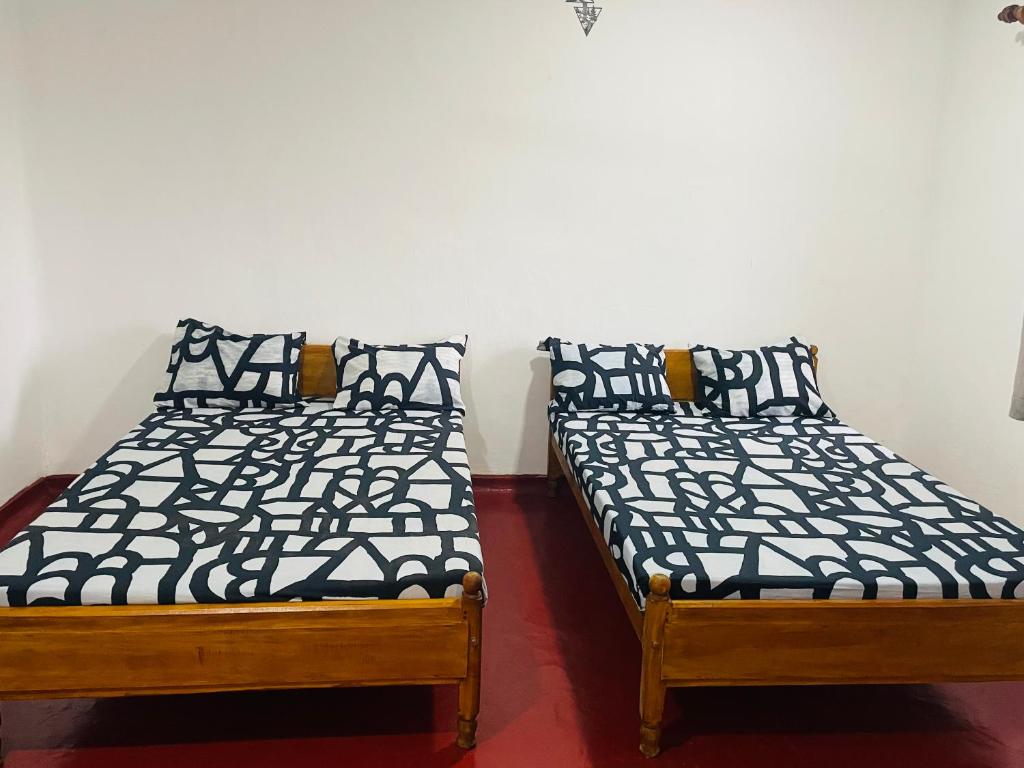 Postel nebo postele na pokoji v ubytování EESTEE Mount