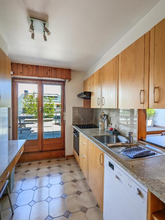 Kuchyň nebo kuchyňský kout v ubytování Penthouse à Nendaz avec Terrasse et Vue Panoramique Exceptionnelle