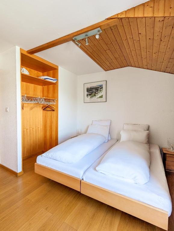 Postel nebo postele na pokoji v ubytování Penthouse à Nendaz avec Terrasse et Vue Panoramique Exceptionnelle