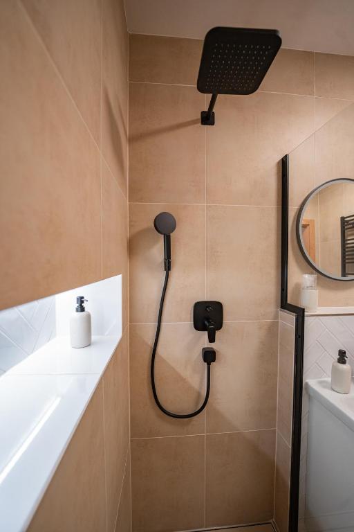 Et bad på Apartmány V zahradě