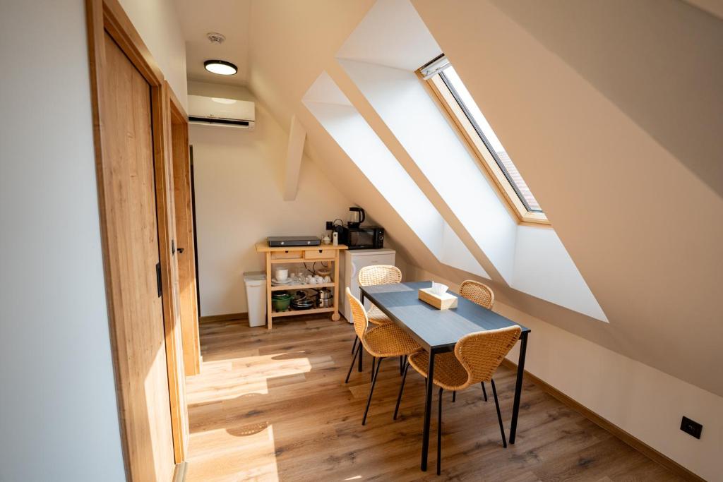 Kjøkken eller kjøkkenkrok på Apartmány V zahradě
