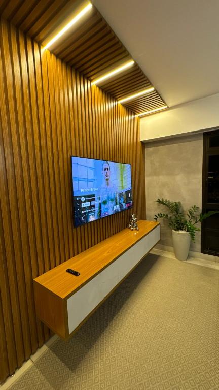 TV a/nebo společenská místnost v ubytování Compacto de luxo - Setor Oeste