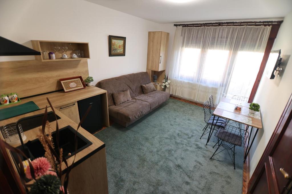 Posezení v ubytování Apartmani Varos & Restaurant