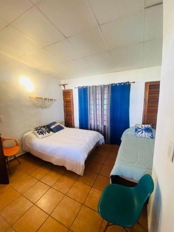 Voodi või voodid majutusasutuse Villa Macadamia toas