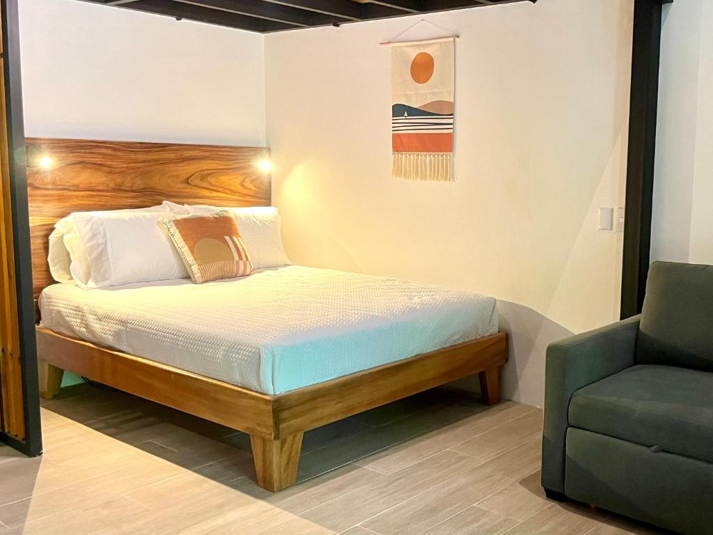 Postel nebo postele na pokoji v ubytování Makanas Beach Bungalows