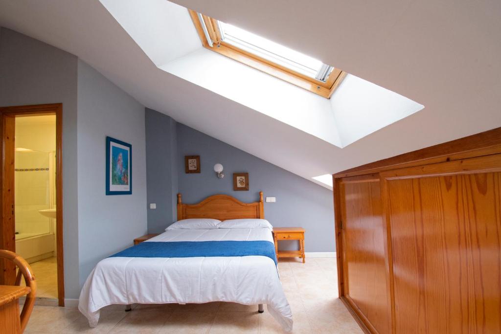 Posteľ alebo postele v izbe v ubytovaní Hotel Campomar