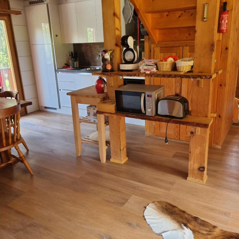 Kuchyň nebo kuchyňský kout v ubytování Chalet Valdonga