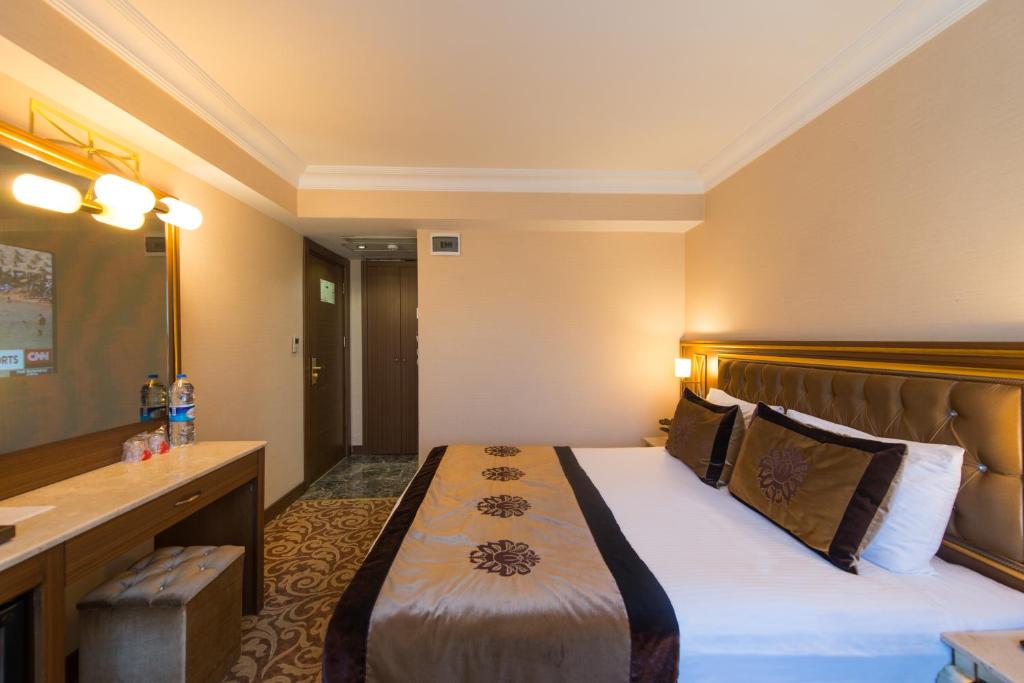 Postel nebo postele na pokoji v ubytování Antea Hotel Oldcity -Special Category