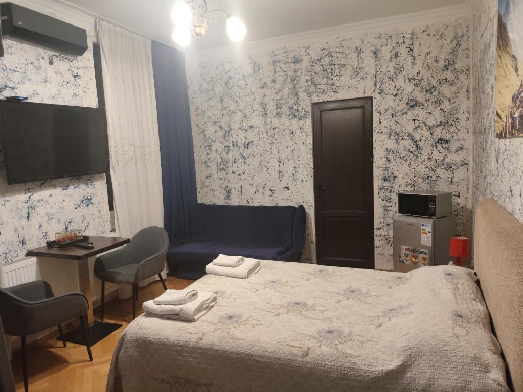 Postel nebo postele na pokoji v ubytování Mia B&B Old Tbilisi