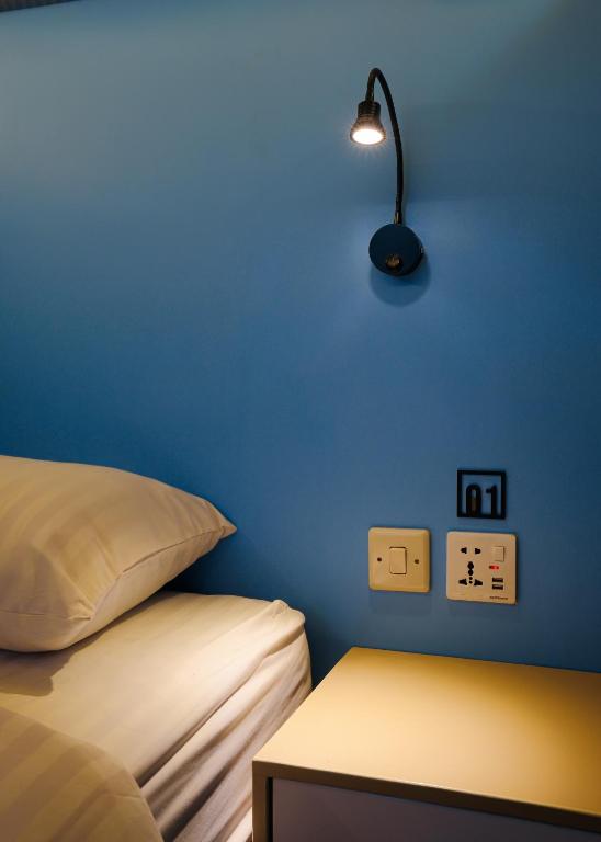 Postel nebo postele na pokoji v ubytování GunYun House