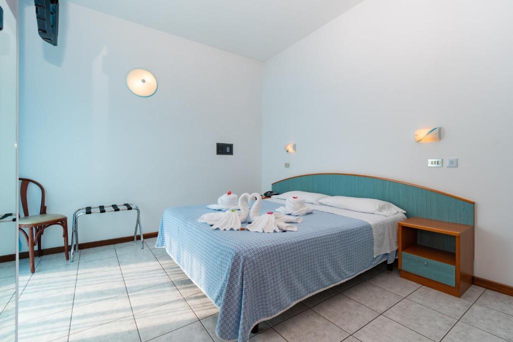 Postel nebo postele na pokoji v ubytování HOTEL BALTIC