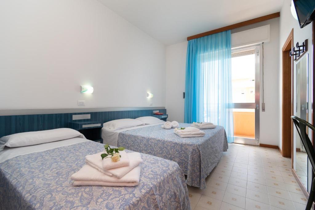 Postel nebo postele na pokoji v ubytování HOTEL BALTIC