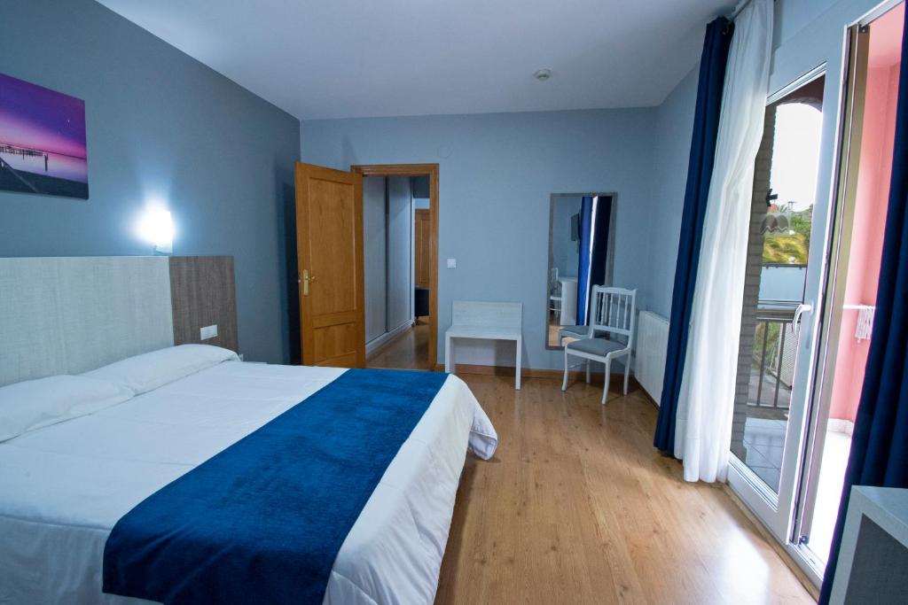 Posteľ alebo postele v izbe v ubytovaní Hotel Campomar