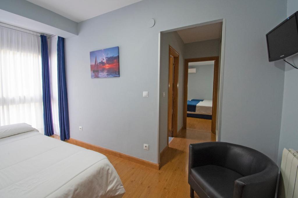 Posteľ alebo postele v izbe v ubytovaní Hotel Campomar