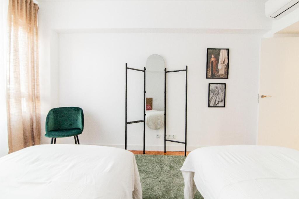 Postel nebo postele na pokoji v ubytování Moderno y Luminoso - Heros