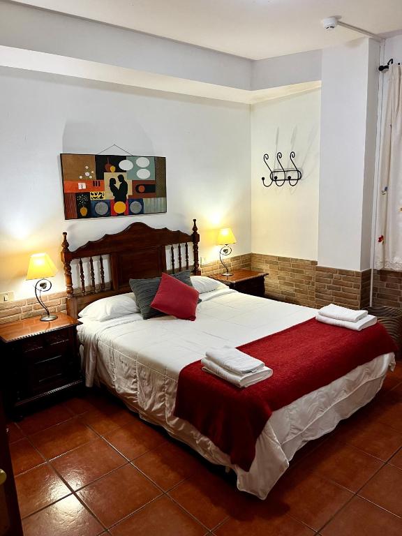 Postel nebo postele na pokoji v ubytování Apartamentos Los Verodes