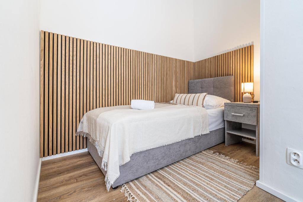Postel nebo postele na pokoji v ubytování Apartmánový Dům Centrum
