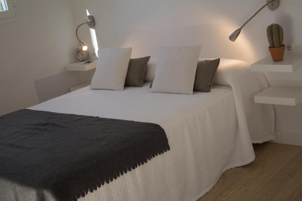 A bed or beds in a room at Casa Gema