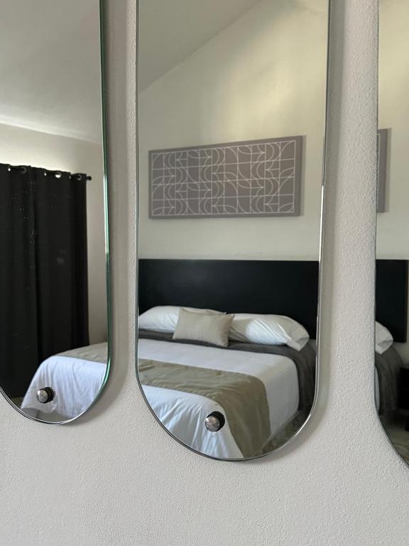 Postel nebo postele na pokoji v ubytování DUNAMIS HOTEL