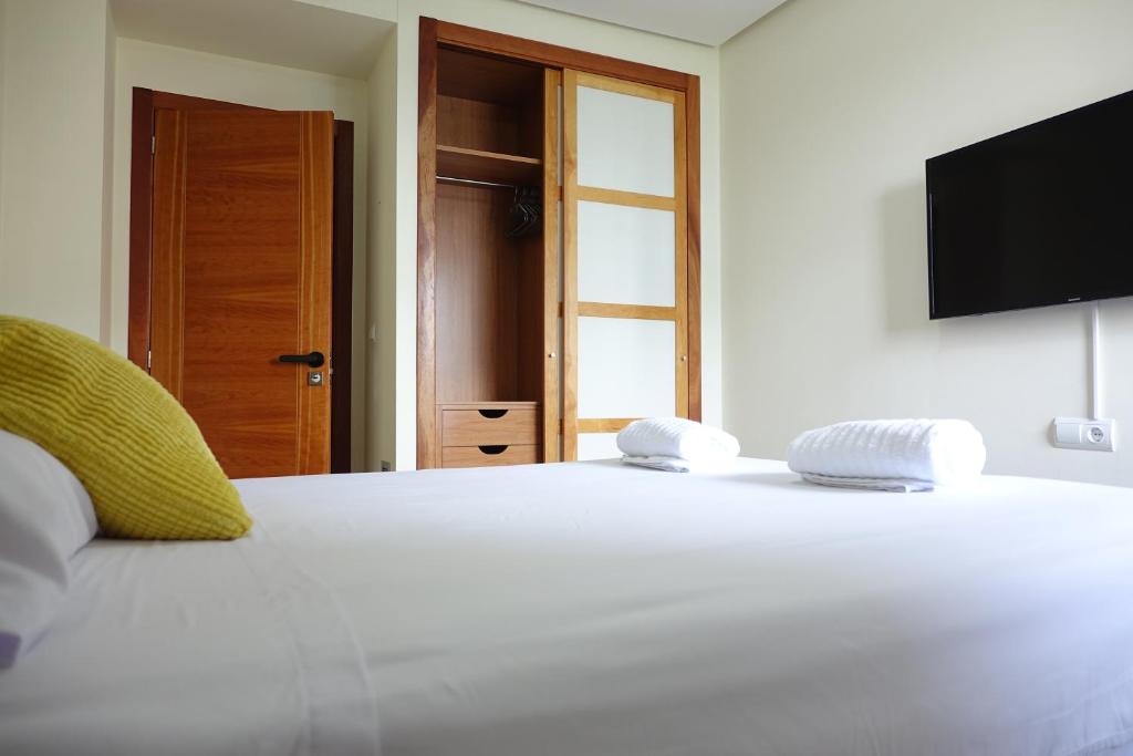 Cama o camas de una habitación en Best Valencia Beach Rooms-Shared Flat