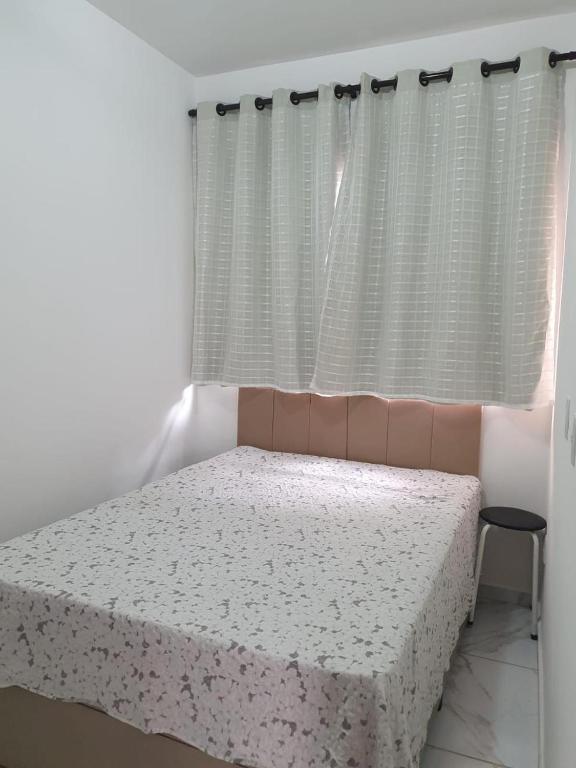 Postel nebo postele na pokoji v ubytování Quarto & Conforto