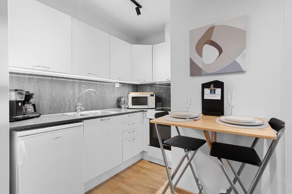 Kuchyň nebo kuchyňský kout v ubytování BraMy Apartments The Bucks Villa