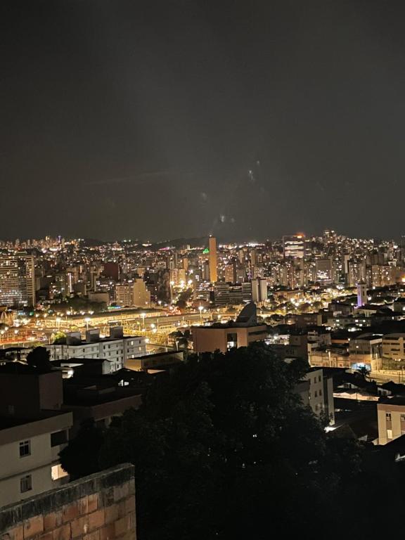 a view of a city at night with lights at Hostel do atleta in Belo Horizonte