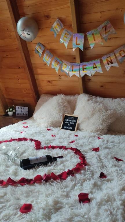 Postel nebo postele na pokoji v ubytování Cabañas Alpina