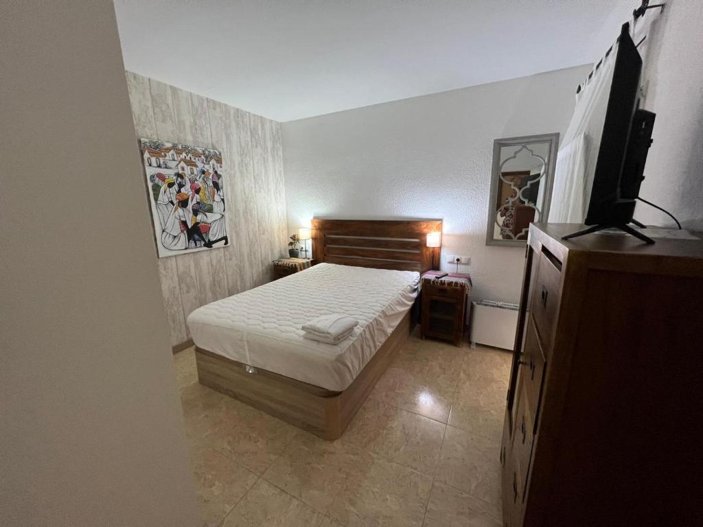 Posteľ alebo postele v izbe v ubytovaní Apartamento con piscina - Tossa - Magníficas vistas al mar