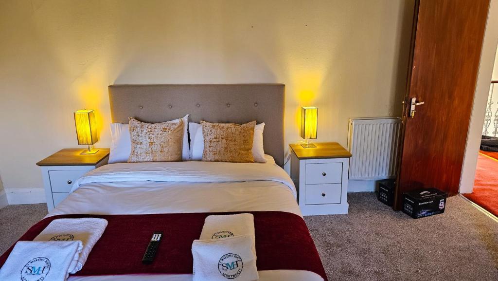 Postel nebo postele na pokoji v ubytování The Kew Rooms