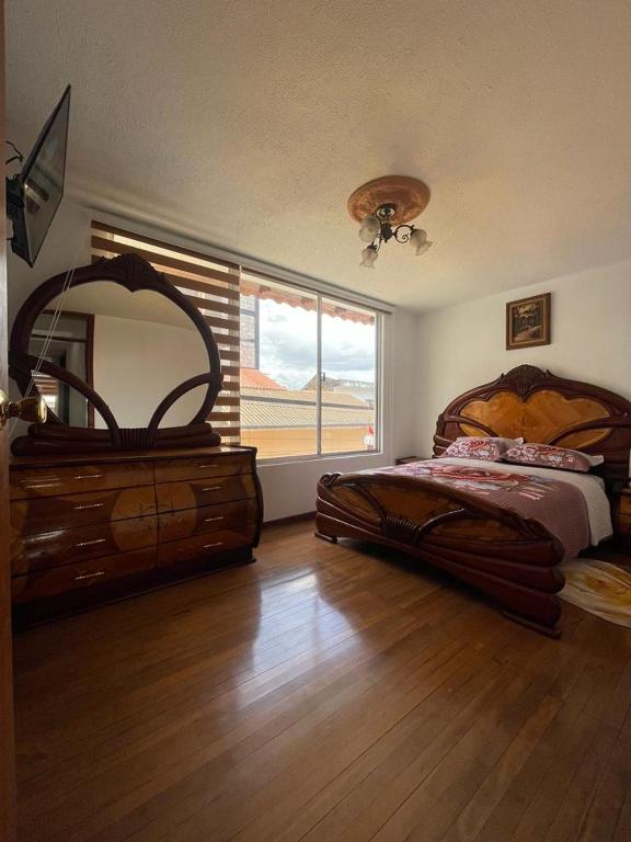 Postel nebo postele na pokoji v ubytování Chaska Hotel