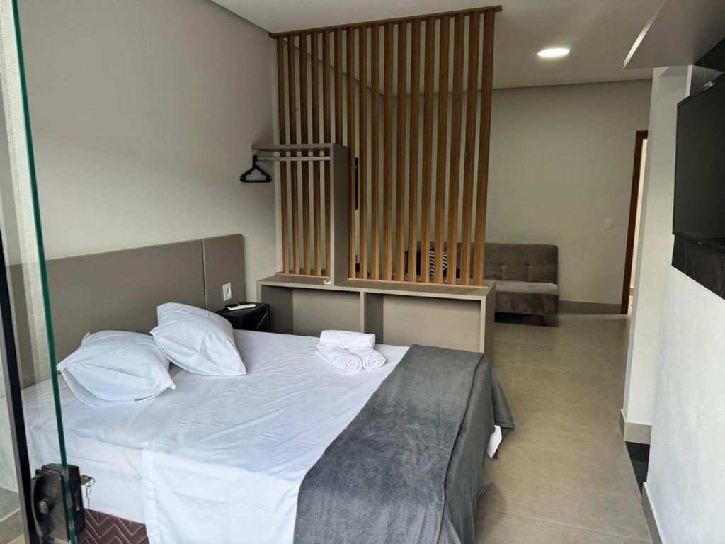 Postel nebo postele na pokoji v ubytování FLATs UTOPIA