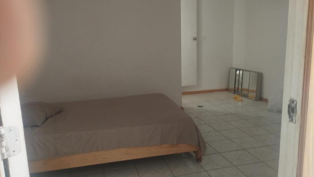 Postel nebo postele na pokoji v ubytování Alojamiento Parque 38