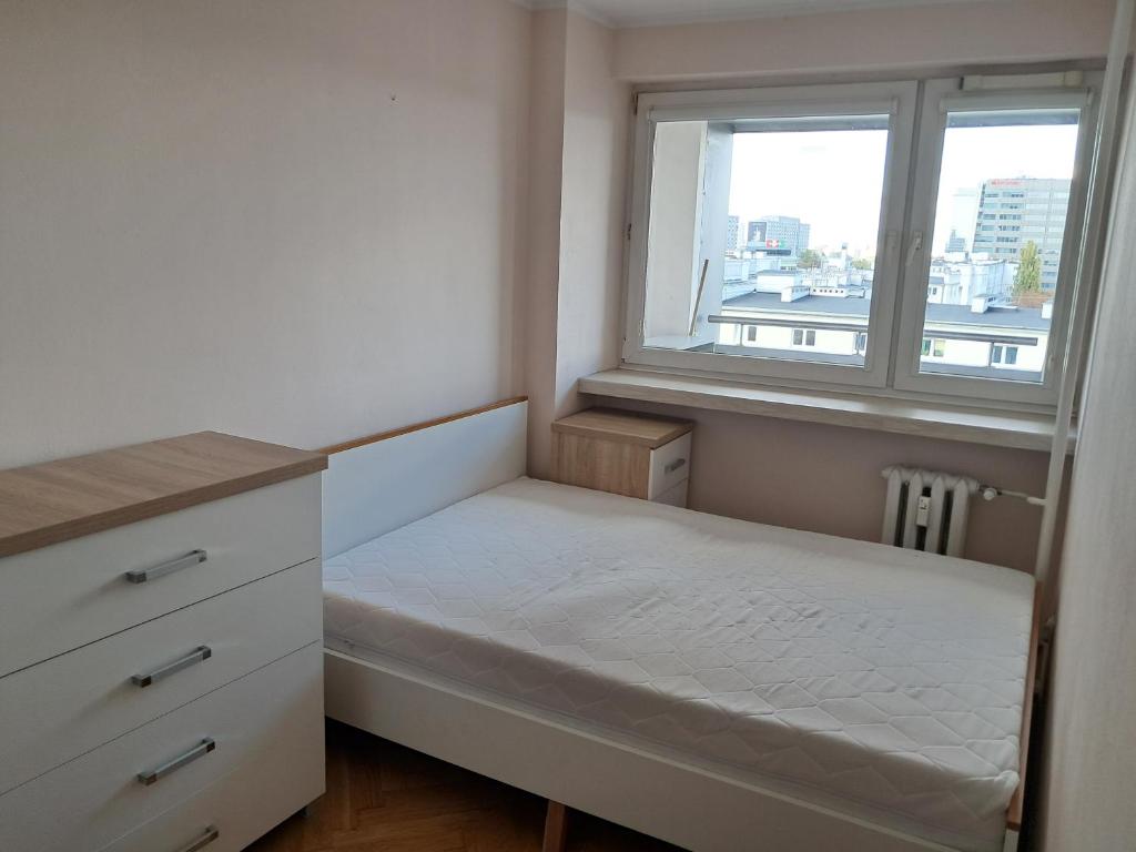 Posteľ alebo postele v izbe v ubytovaní bonApartments