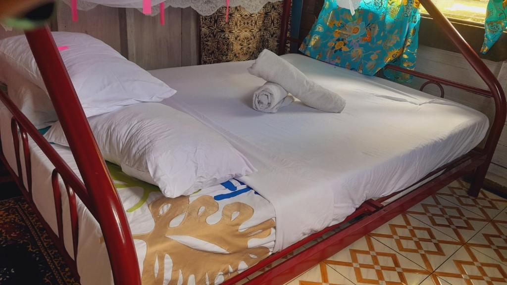 Postel nebo postele na pokoji v ubytování Tai Evi 2