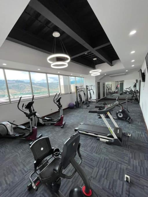 Fitness centrum a/nebo fitness zařízení v ubytování Moderno y cómodo apartamento