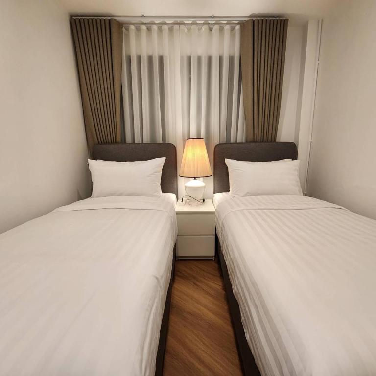 Cama ou camas em um quarto em Sleep Walker Poshtel