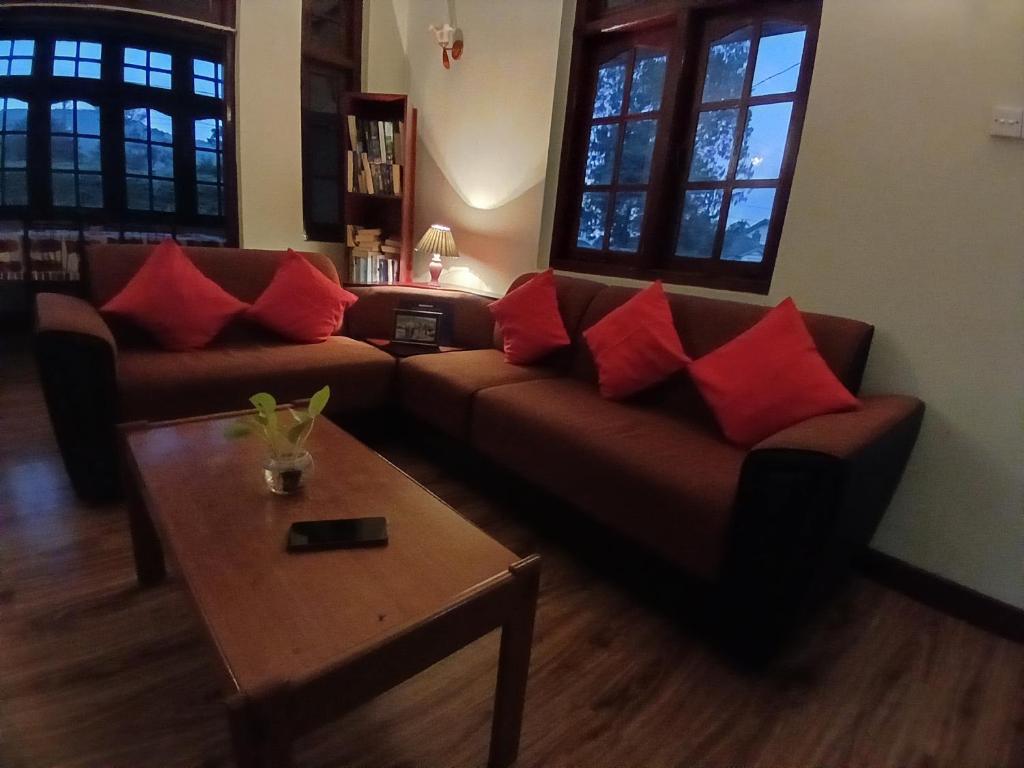 Posezení v ubytování Paradise Cottage