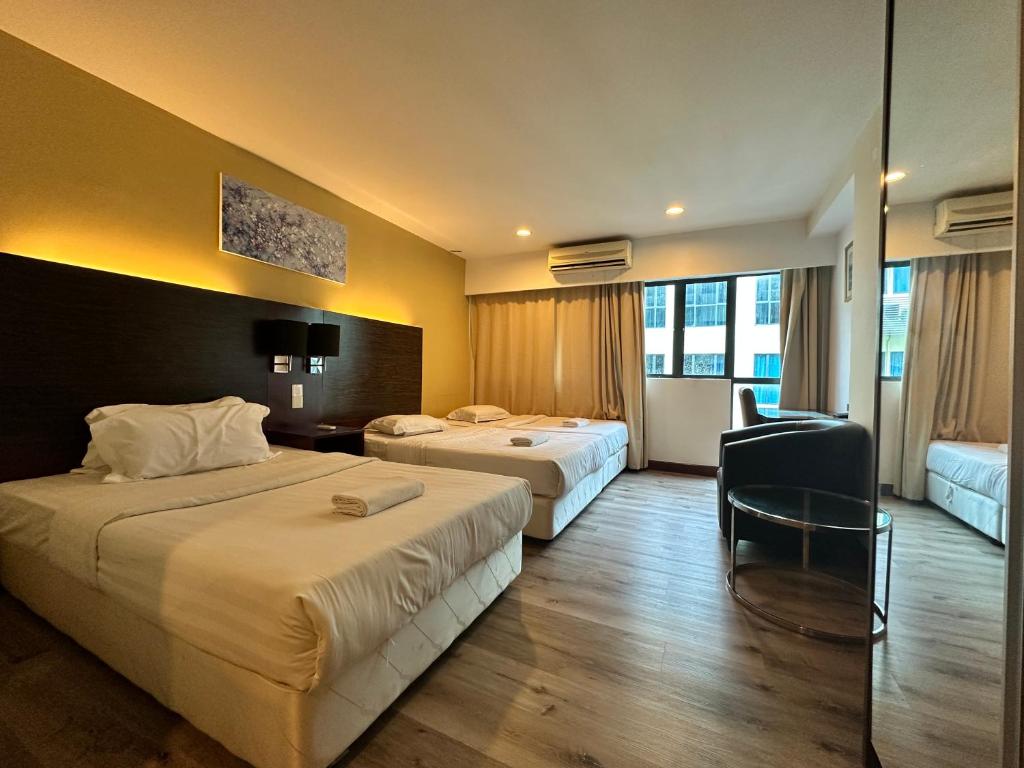 Letto o letti in una camera di Ming Greenage Suite 明绿时代套房 @Kota Kinabalu 亚庇市中心