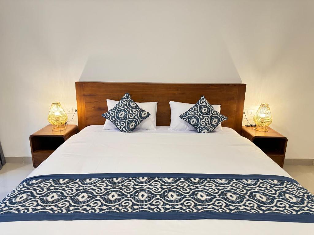 Postel nebo postele na pokoji v ubytování Puri Teduh Guesthouse Ubud