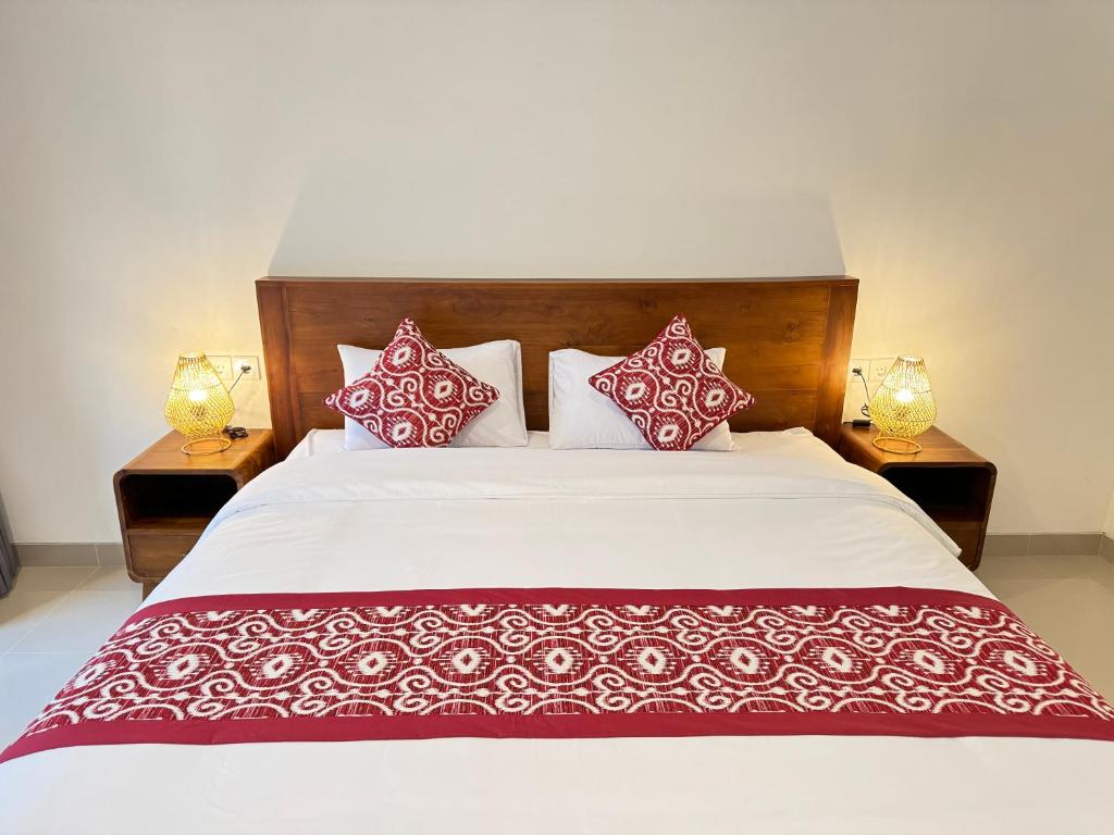 Postel nebo postele na pokoji v ubytování Puri Teduh Guesthouse Ubud