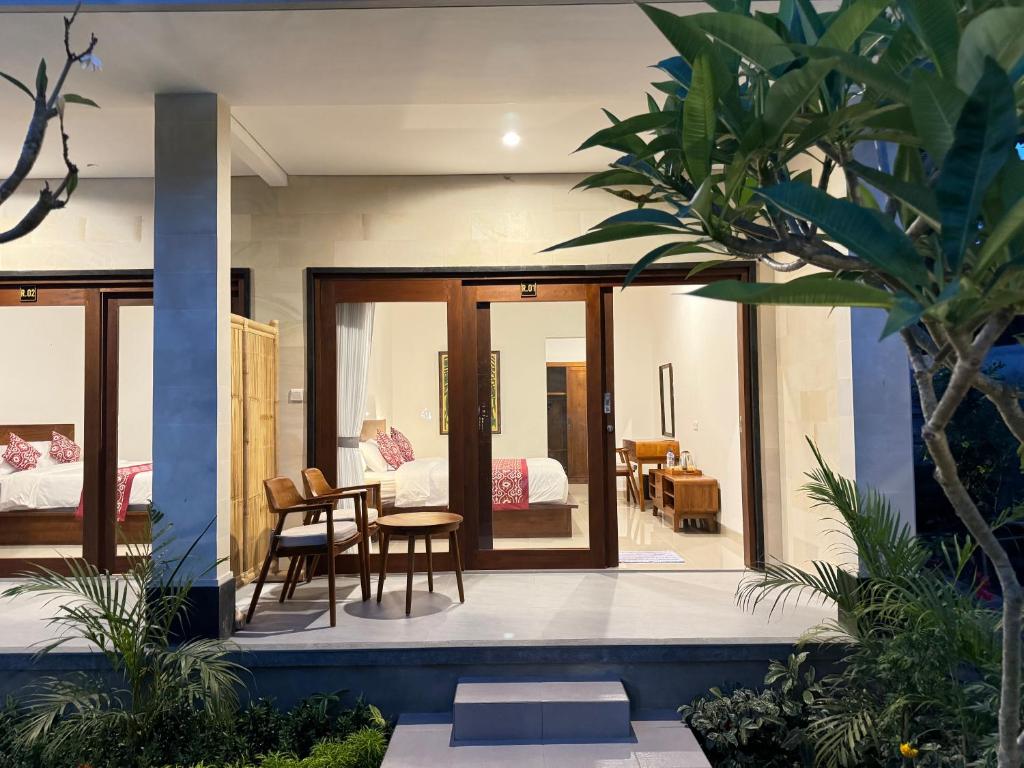 Posezení v ubytování Puri Teduh Guesthouse Ubud