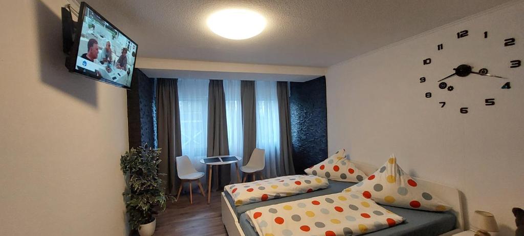 TV a/nebo společenská místnost v ubytování FeWo1&Frisch Renovierte Wohnung