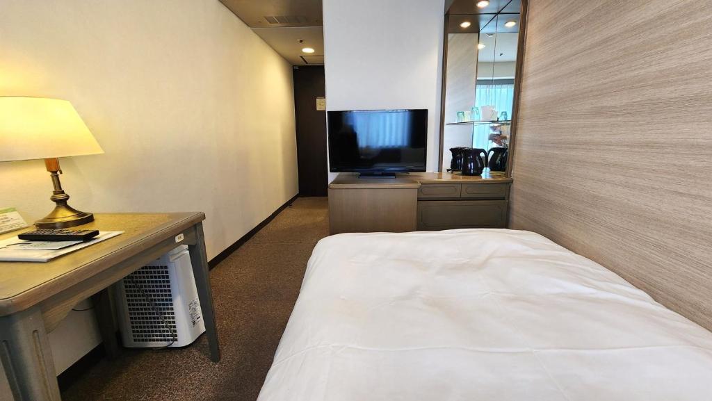 Letto o letti in una camera di Platon Hotel Yokkaichi