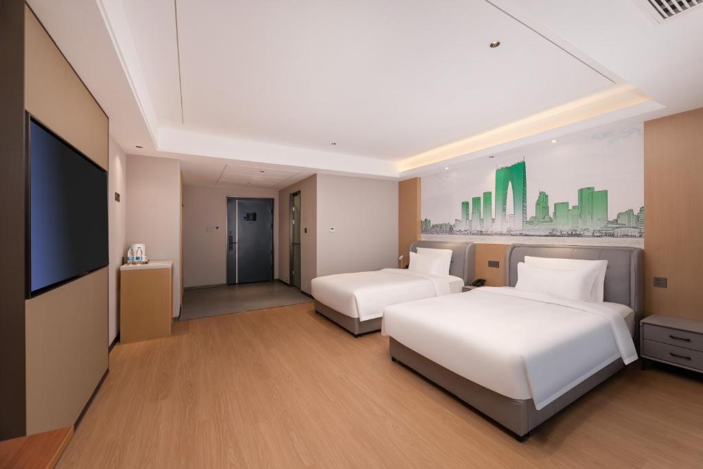 Fotografie z fotogalerie ubytování Yilong Michael International Hotel Suzhou Industrial Park Nanhuanqiao Market Branch v destinaci Jiangtian
