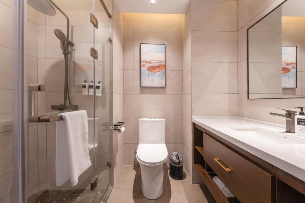 Fotografie z fotogalerie ubytování Yilong Michael International Hotel Suzhou Industrial Park Nanhuanqiao Market Branch v destinaci Jiangtian