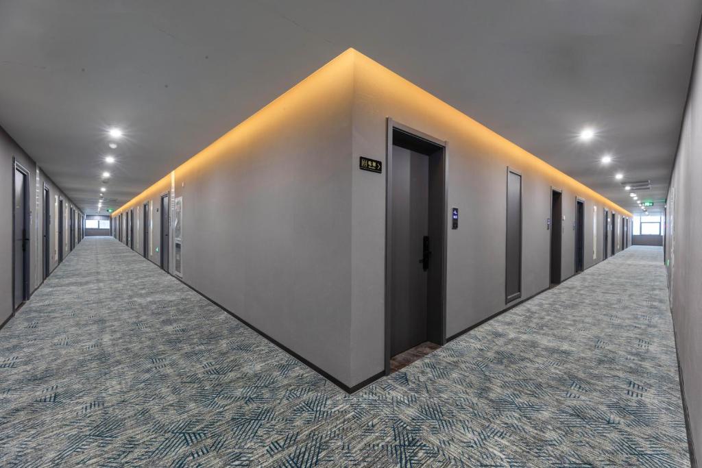 Fotografie z fotogalerie ubytování Yilong Michael International Hotel Suzhou Industrial Park Nanhuanqiao Market Branch v destinaci Jiangtian
