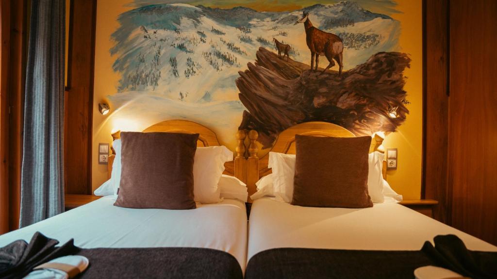 Postel nebo postele na pokoji v ubytování Apartaments La Neu